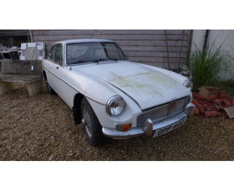 An MGB GT petrol two door hatch back Sports Car with chrome wire wheels and manual gearbox - Registration number: GPP 44G - M