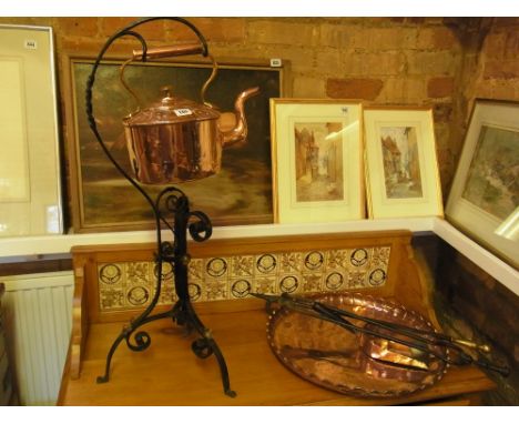 A wrought iron kettle stand with copper kettle, a copper dish, coal shovel and two fire irons