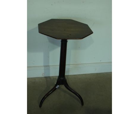 A Georgian mahogany tripod side table with an octagonal top raised on gun barrel stem and down swept legs - Height 78 cm x 45