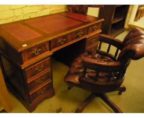 A modern mahogany twin pedestal desk with six drawers and a cupboard - 1.23 m x 61 cm with a button leather effect office cha