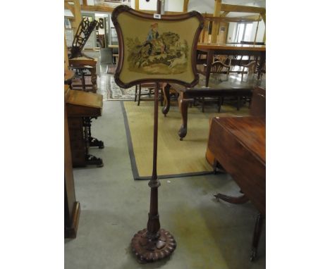 A Victorian mahogany pole screen with embroidered Hunting scene 