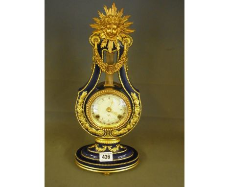 A Victorian and Albert museum fine porcelain Marie-Antoinette mantel clock - striking on two bells - Height 39 cm 
Condition 