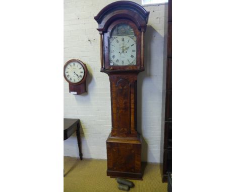 A 19th century mahogany eight day striking longcase clock with a painted arched - rocking ship - 14" dial, having secondary d