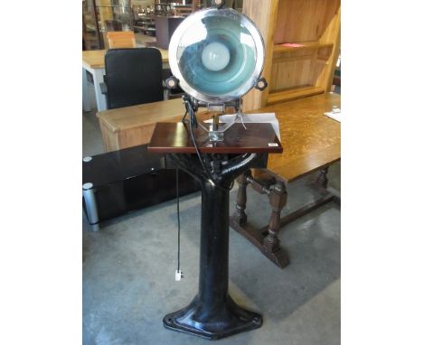 A Spot Lamp mounted on industrial base 
Condition report: In working order