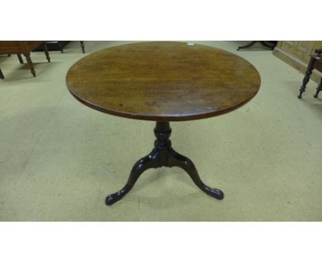 A Georgian mahogany tilt top side table on a tripod base - Diameter 77 cm