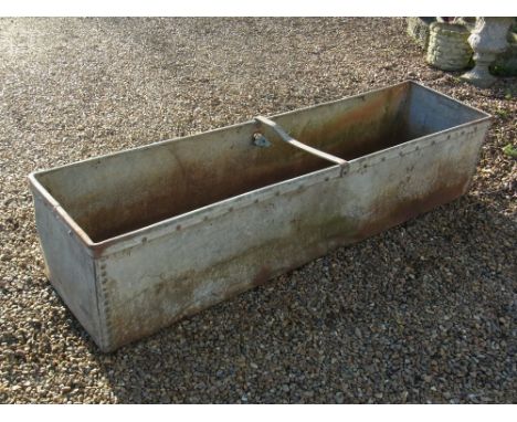 A galvanized cattle trough - Height 39 cm x 184 cm x 48 cm