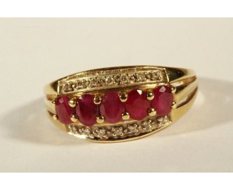 A 9ct yellow gold ruby and diamond ring (N)