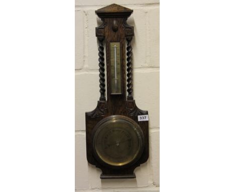 An oak framed barometer H 63cm
