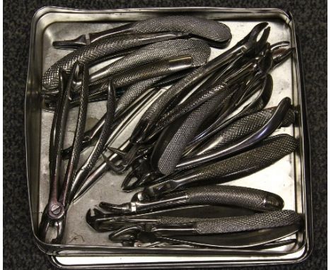 A quantity of old dentists tools