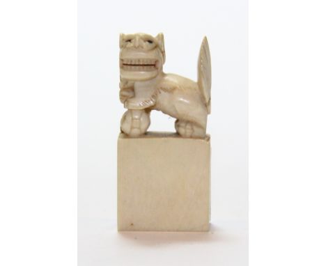 A Chinese carved ivory seal, early 20th century H 5.5cm