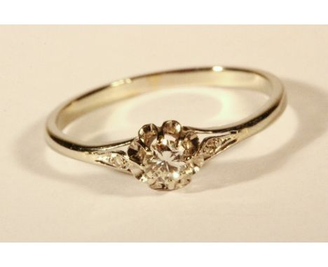 A white metal (tested platinum) diamond solitaire ring (R.5)