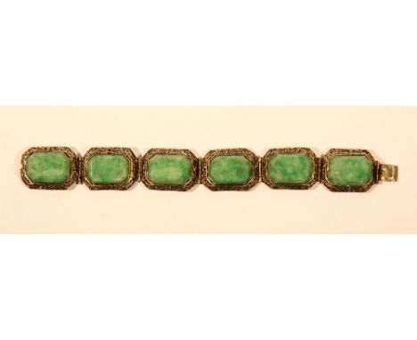 A 1920s Chinese gilt filigree silver and jade bracelet