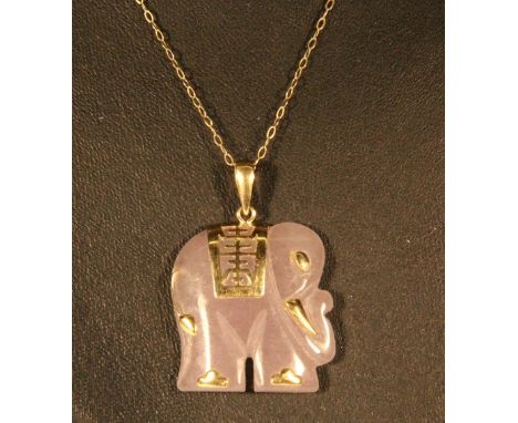 A lavender jade elephant pendant on a 9ct gold chain
