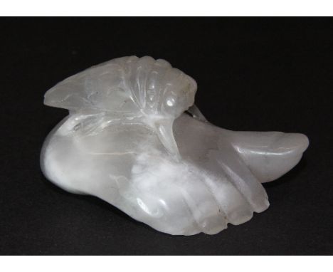 An interesting Chinese carved rock crystal scroll weight of the Buddha's foot with a cicada L 9.5cm H 5cm