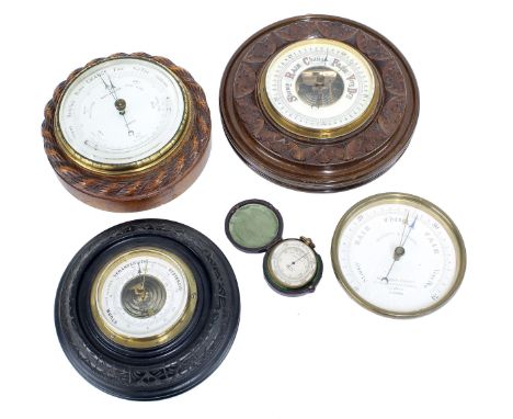 Oak circular wall barometer, the 5" dial signed Norie &amp; Wilson, London, within a rope twist surround; also another circul