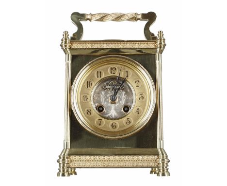 Brass two train mantel clock with barometer, striking on a gong, the 3.75" gilt chapter ring enclosing a foliate engraved rec
