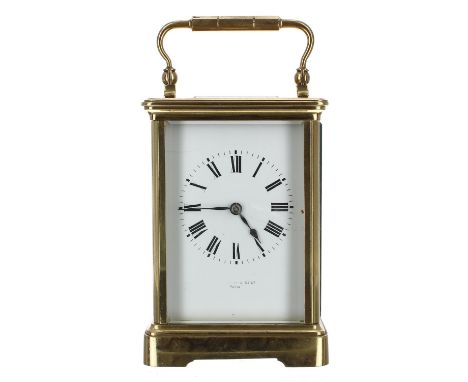 French carriage clock striking on a gong, the dial indistinctly signed, within a corniche brass case, 7" high (key) 