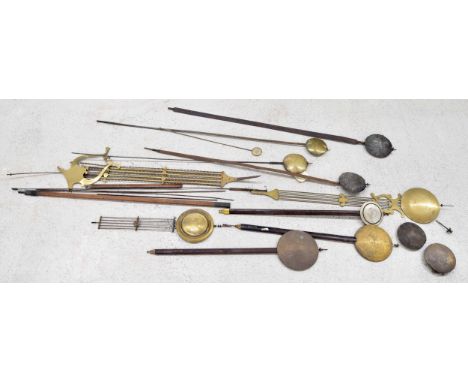 Large quantity of longcase clock rods and pendulums;&nbsp;also a quantity of smaller pendulums and bobs 