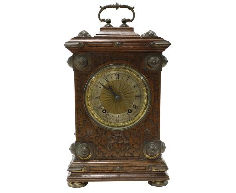 German gothic oak ting-tang mantel clock, the W &amp; H movement striking on two gongs, the 4.75" silver chapter ring enclosi