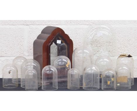 Clock dome and stand,&nbsp;16.5" high overall; also a quantity of smaller circular glass and plastic domes and a wooden brack
