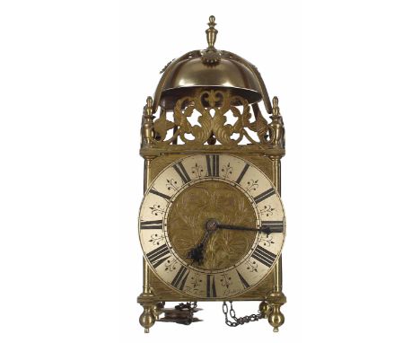 English brass verge lantern clock, the 6.25" silvered chapter ring signed Thomas Talbot, London and enclosing a foliate engra