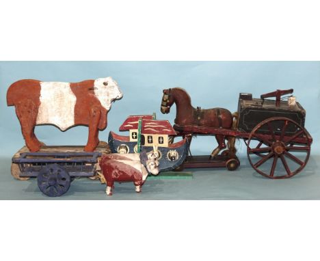 A collection of wooden toys: a pull-along Folk Art cow, a pull-along horse and bowser, a pair of oxen yoked to a cart (a/f) a