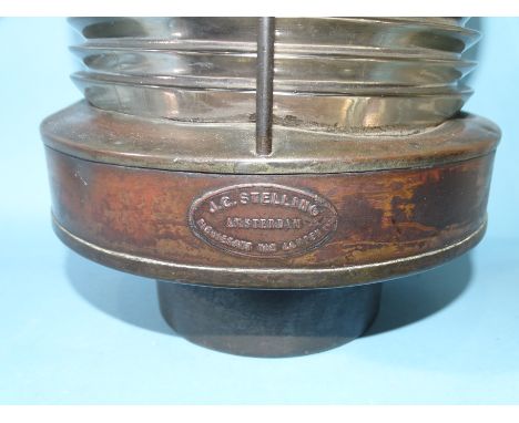 J C Stelling, Amsterdam, a copper ship's lamp, 50cm high (including hanging loop).