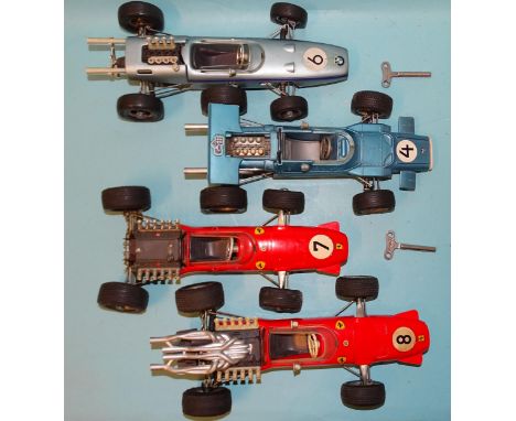 Four Schuco large-scale racing cars: two 1073 F2 Ferraris (one a/f), 1072 F2 BMW and 1074 F1 Matra-Ford, (4). 