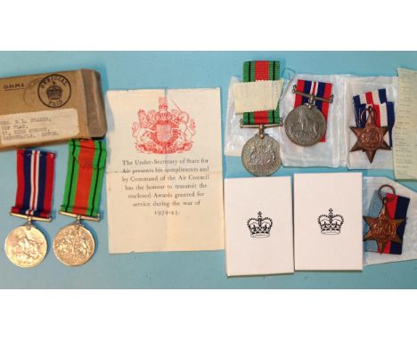 A WWII pair of medals, Defence and 1939-45 War Medal, with certificate and box of issue addressed to Mrs M L Pearse and four 