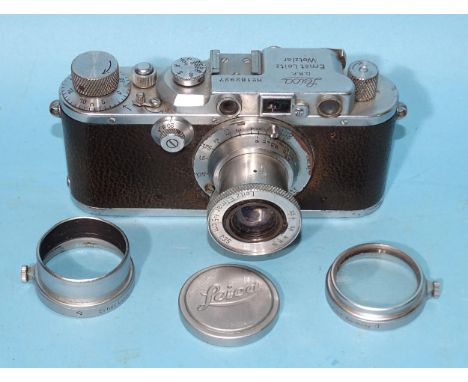 A Leica IIIA 35mm rangefinder camera 1935, with Leitz Elmar f:5cm 1:35 lens, serial no.182927. 