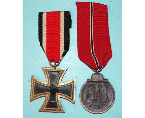 A WWII Iron Cross (2nd Class) and a 1941-42 Eastern Front Medal, (2). 