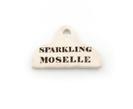 A 19th century ceramic bin label, unmarked, arched rectangular form, titled 'SPARKLING MOSELLE', length 13cm.