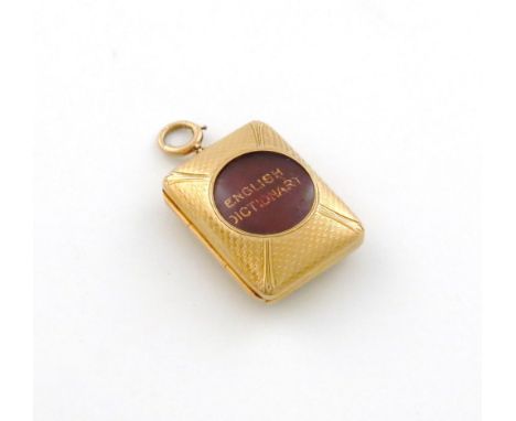 A late-Victorian 14 carat gold cased miniature dictionary, 'The Smallest Dictionary in the World', the case marked 14K, the d