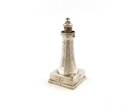 A novelty silver lighthouse table cigar lighter, by Sanders and Mackenzie, Birmingham 1931, tapering form, the hinged cover a