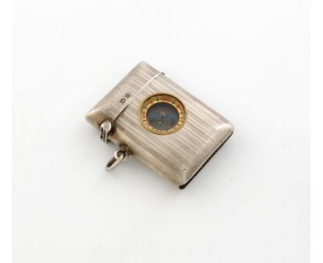 A novelty silver vesta case, by J. C Gloster Limited, Birmingham 1919, rectangular form, engine-turned decoration, the body s