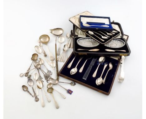 A mixed lot of silver flatware, various dates and makers, comprising: a George III toddy ladle, a sauce ladle, a cased commem