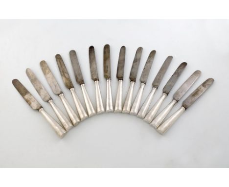 A set of fourteen silver-handled table knives, by The Harrison Brothers and Howson, Sheffield 1890, tapering oval form, the t