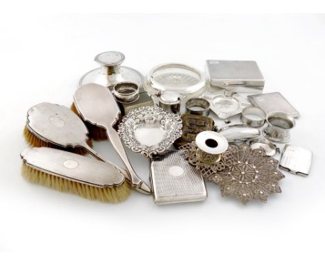 A mixed lot of silver items, various dates and makers, comprising:a capstan inkwell, inscribed, a cigarette box, two cigarett