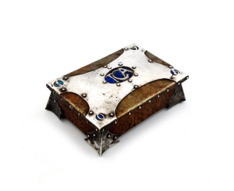 An Arts and Crafts mixed metals casket, unmarked, rectangular form, the copper body applied with strap-work mounts and with e