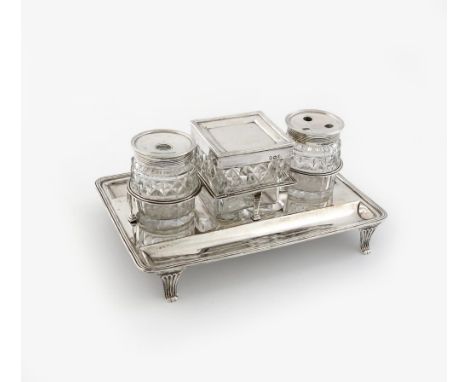A George III silver inkstand, by James Turner and Charles Fox, London 1803, rectangular form, reeded border, with a wire-work