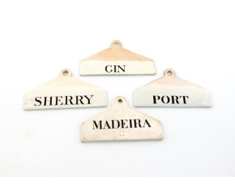 A small collection of four 19th century ceramic bin labels, comprising three by Wedgwood, tapering arched rectangular form, t
