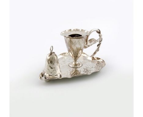 A late Victorian electroplated chamber stick, by Hukin and Heath, the base of leaf form, textured decoration, scroll handle, 