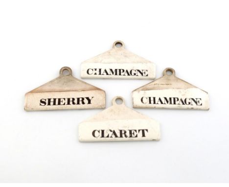A small collection of four 19th century ceramic bin labels, by Minton, tapering arched rectangular form, titled 'CHAMPAGNE', 