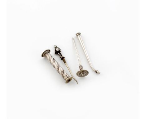 A 19th century Dutch silver pipe tamper, tapering form, the circular tamper with a foliate motif, the screw-off handle reveal