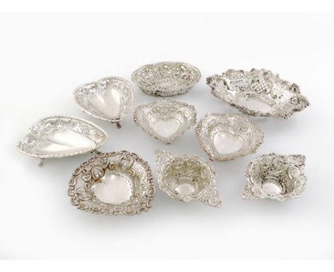 A mixed lot of nine silver bon bon dishes, comprising: a heart shaped pair, by Henry Wilkinson & Co, London 1894, with pierce