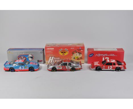 Scarce 1/24 scale American Action Racing Series Stock Cars. Includes No. 43 Blue Red Ltd Edition, Kevin Harwick and One other