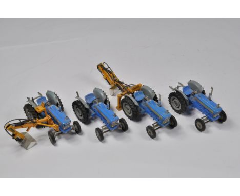 Fine selection of Corgi Toys Ford 5000 Tractor Models. In need of a clean but otherwise generally NM. (4)