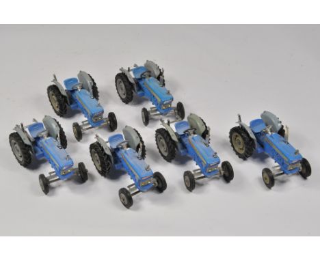 Fine selection of Corgi Toys Ford 5000 tractor Models. In need of a clean but otherwise generally NM. (6)
