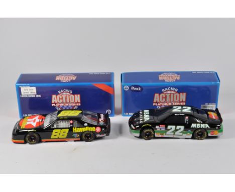 Scarce 1/24 scale American Action Racing Series Stock Cars. Includes Ernie Irvan and Ward Burton. M in boxes. (2)