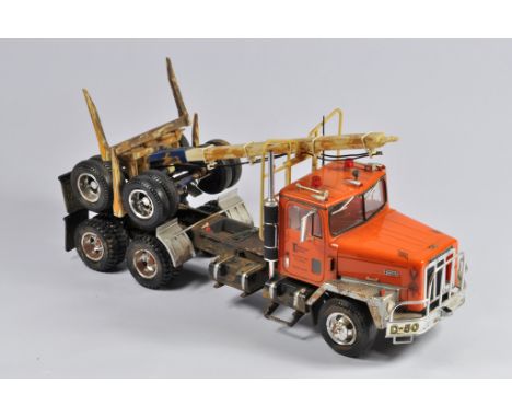 Interesting Early 1/25 Scale AMT International Paystar 5000 Logging Truck Tractor Kit. Assembled and finished to a high stand